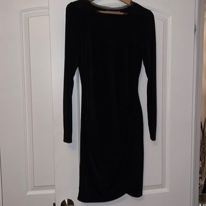 Form fitting black dress.